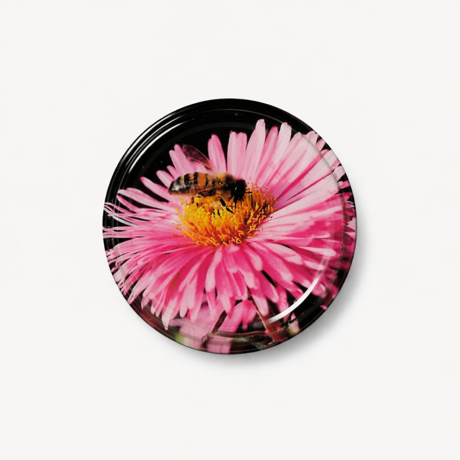 Capsule TO 63 abeille sur fleur noire